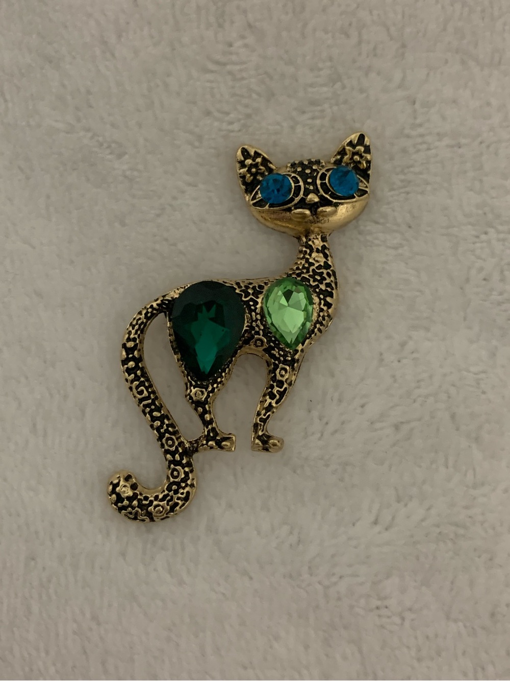 Gold-tone Cat Brooch with Green and Blue Gemstones